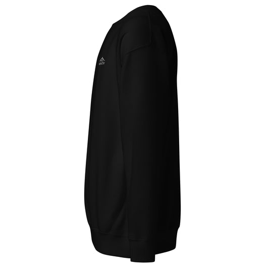Seitliche Ansicht des schwarzen MONTIV Sweaters zur Veranschaulichung der Passform und Materialstruktur.